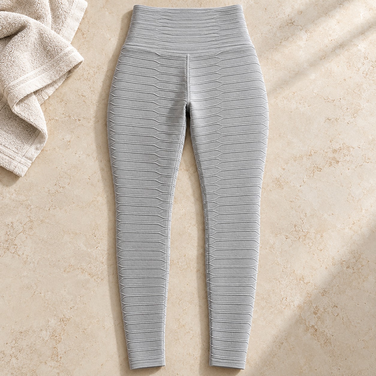 Grey textured high-waist gym leggings flat lay